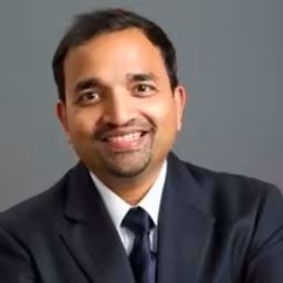 Headshot of Raghu Kopalle, Vice President of Product and Engineering at Prodoscore